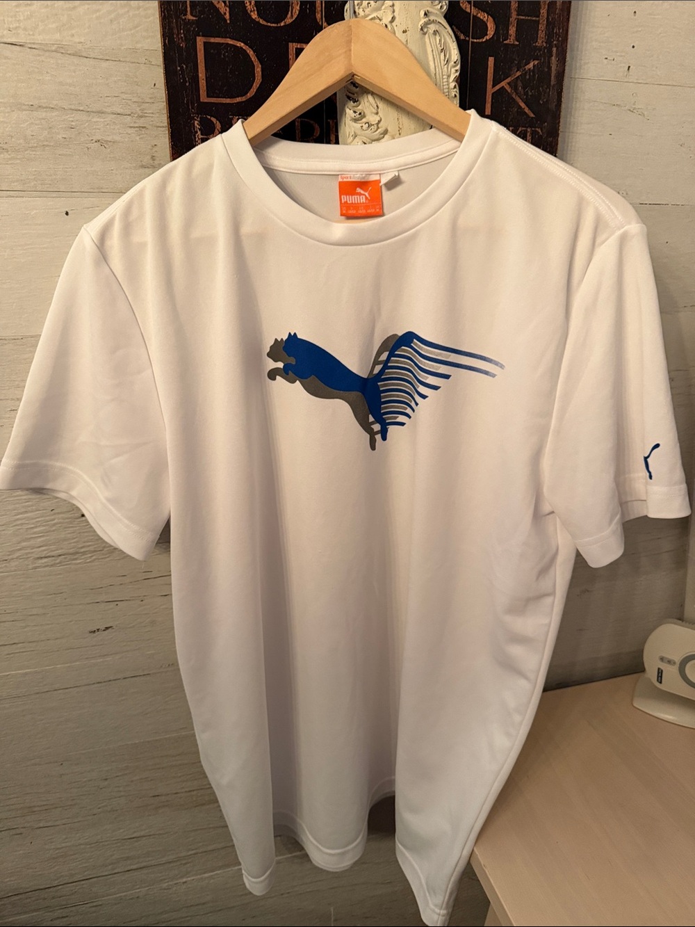 Puma White Short Sleeve Tee with Blue Puma Graphic